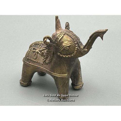 147 - Three brass dhokra cast Elephants from Orissa including one as a candle holder, tallest 9cm high / A... 