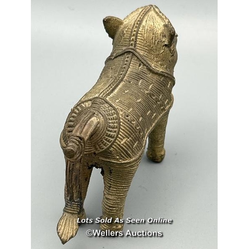 149 - Four brass dhokra cast animals including three Tigers and a Cow, tallest, 7cm high / AN48