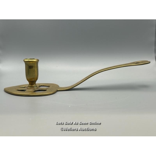 153 - A brass chamberstick with pierced heart shaped base, inscribed 'Luckin Booth, Edinburgh, 1703' 24cm ... 