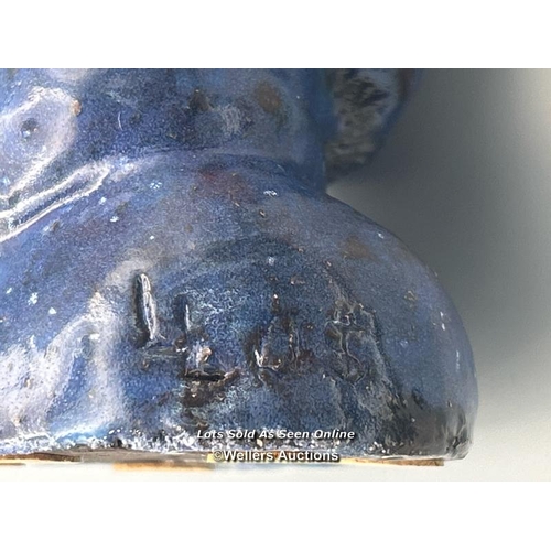 165 - Abstract sculpture of a figure with blue glaze, signed 'LL 03', 18.5cm high with a Pomegranate ceram... 