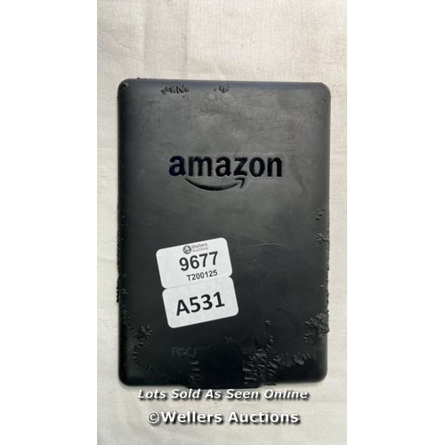 9677 - AMAZON KINDLE/ BLACK - BACK DAMAGED