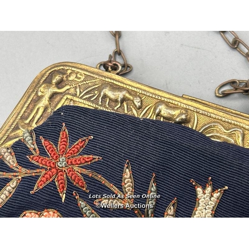 182 - Two vintage evening purses, one with embroidered flowers and metal clasp decorated with farmers and ... 