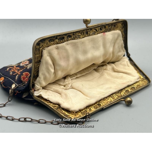 182 - Two vintage evening purses, one with embroidered flowers and metal clasp decorated with farmers and ... 