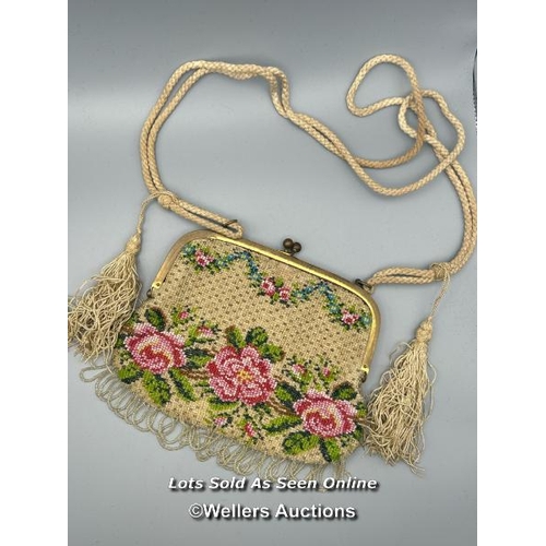 182 - Two vintage evening purses, one with embroidered flowers and metal clasp decorated with farmers and ... 