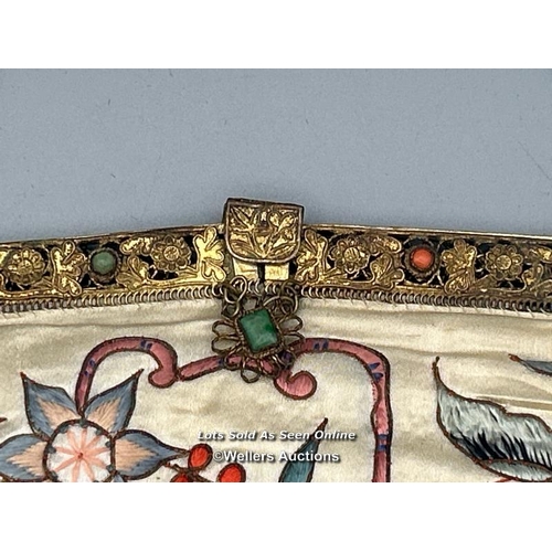 183 - A vintage silk evening purse embroidered with flowers and butterfly design, filigree brass clasp wit... 