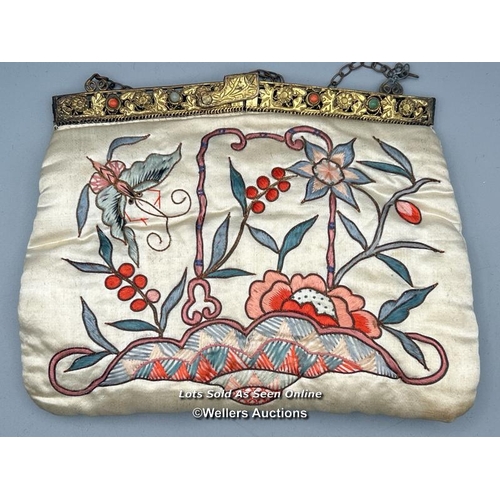 183 - A vintage silk evening purse embroidered with flowers and butterfly design, filigree brass clasp wit... 