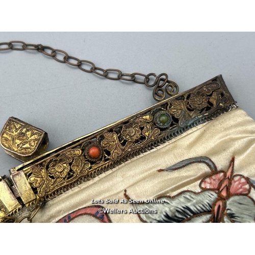 183 - A vintage silk evening purse embroidered with flowers and butterfly design, filigree brass clasp wit... 