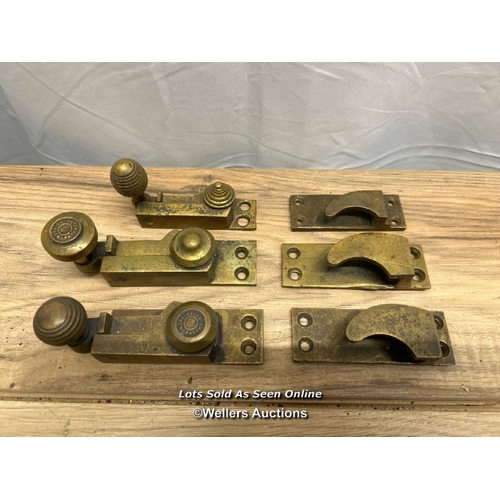 347 - X3 vintage brass sash window fasteners, two with wording 'Hopkinson patent'