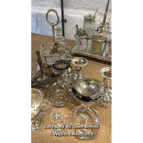 196 - Assorted silver plate including cruet set, candle holders and pierced sherry glass holders / AN17