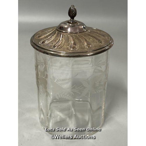 198 - A vintage silver plate and cut glass claret jug stamped A1, glass jar with ornate metal lid, placema... 