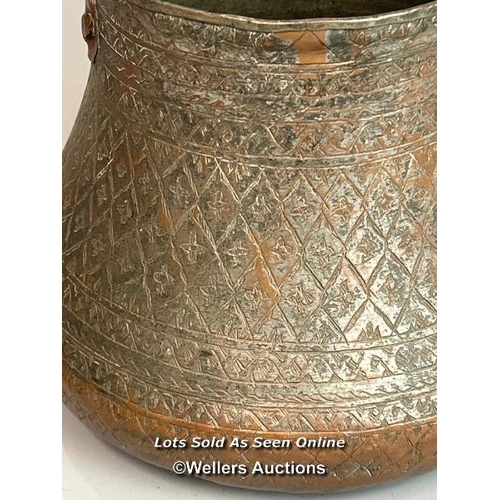 233 - Antique middle eastern copper pot with decorative handle, 20cm high, 24cm diameter at the base / T37