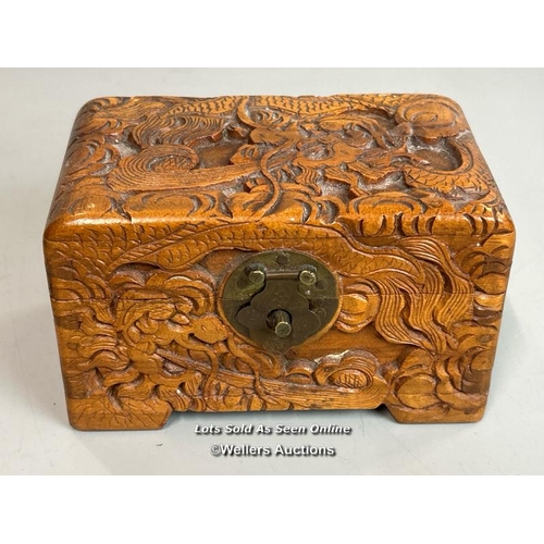 239 - Two decorative wooden boxes including a camphor wood box carved with Serpent / Sea Dragon,  plaque o... 