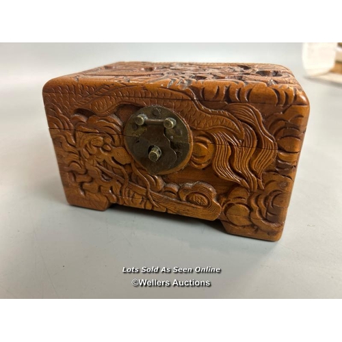 239 - Two decorative wooden boxes including a camphor wood box carved with Serpent / Sea Dragon,  plaque o... 