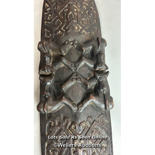 244 - African carved shield and spear with integrated blow pipe , shield 94cm high, spear 114cm long / T36