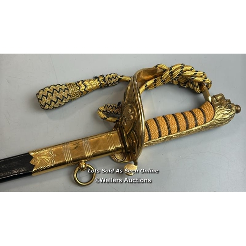 211 - A modern Naval officers sword made by Renown, gilt brass and plastic hilt with Lion motif, blade etc... 