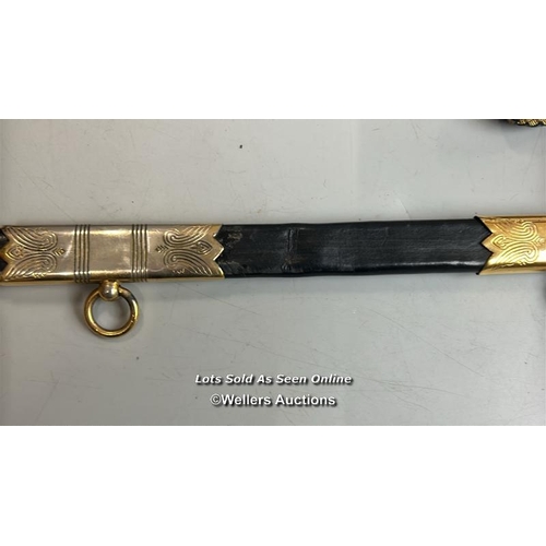 211 - A modern Naval officers sword made by Renown, gilt brass and plastic hilt with Lion motif, blade etc... 