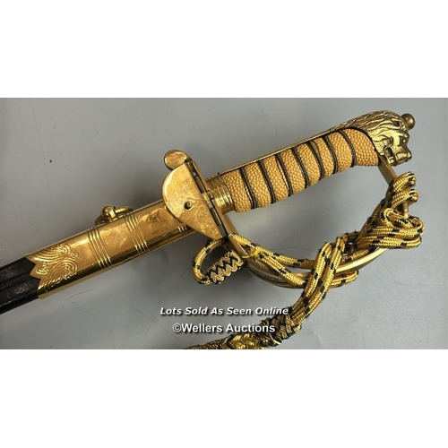 211 - A modern Naval officers sword made by Renown, gilt brass and plastic hilt with Lion motif, blade etc... 