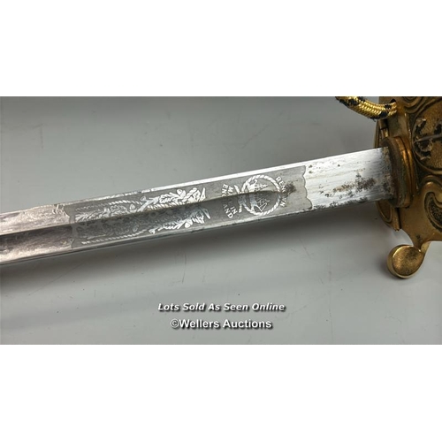 211 - A modern Naval officers sword made by Renown, gilt brass and plastic hilt with Lion motif, blade etc... 