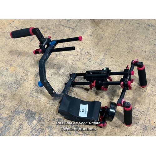 58 - Neewer steady cam rig / Buyer will be responsible for removal, located in the large hall / Lot Locat... 