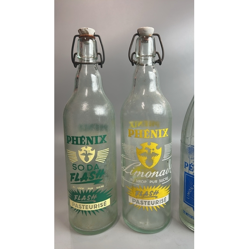 12 - Five vintage French bottles including Phenix Limonade / AN7