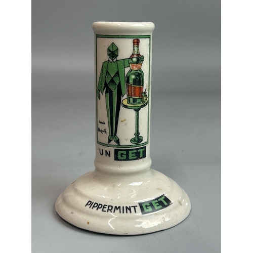 13 - A vintage french ceramic 'Pippermint Get' straw holder with two ceramic advertising match strikers i... 