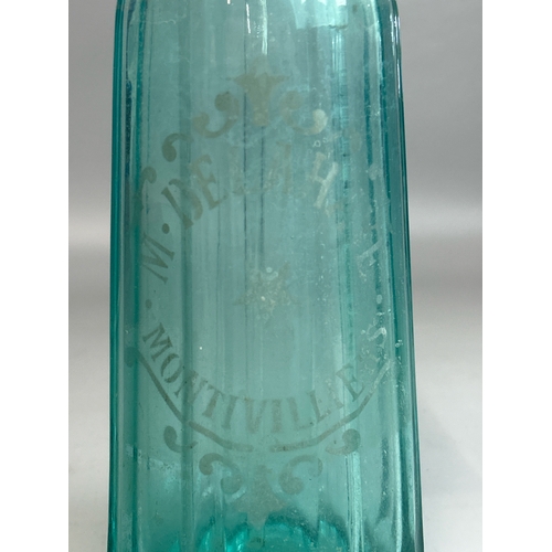 14 - Four vintage acid etched glass soda syphons including 'Klein Preignac', 'Maurice - Delahaye' dated 1... 