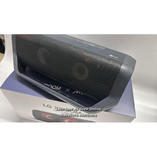 8933 - LG PN7 PORTABLE WIRELESS SPEAKER / POWERS UP / SIGNS OF USE / CONNECTS TO BT / PLAYS MUSIC