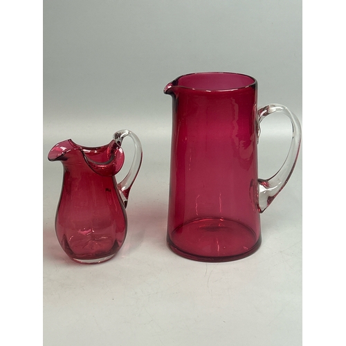 42 - Assorted red / cranberry glassware including wine glasses by Bohemia, sherry and port glasses, jugs ... 