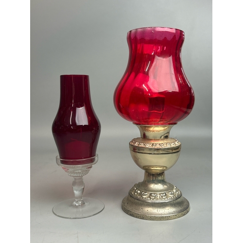 47 - A collection of red / cranberry glassware to include candle holders, vases and rose bowl (9) / AN9