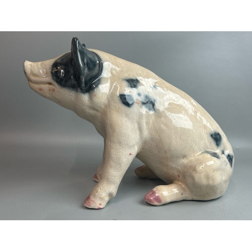 50 - A large porcelain model of a Pig, 32cm high, 46cm long / AN10