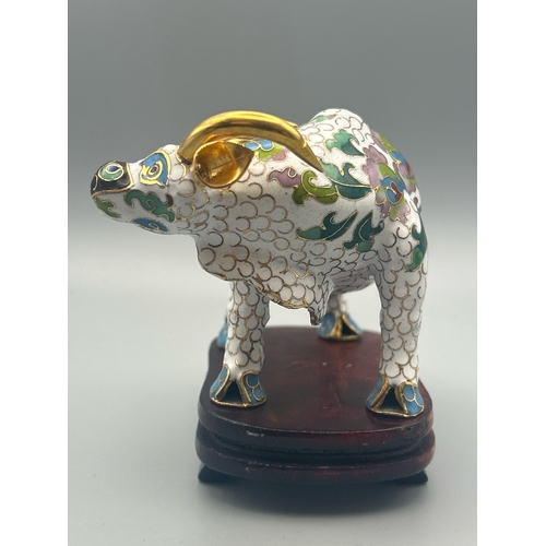 57 - A vintage cloisonne figure of a Buffalo on a carved wood stand , 6cm high / AN17