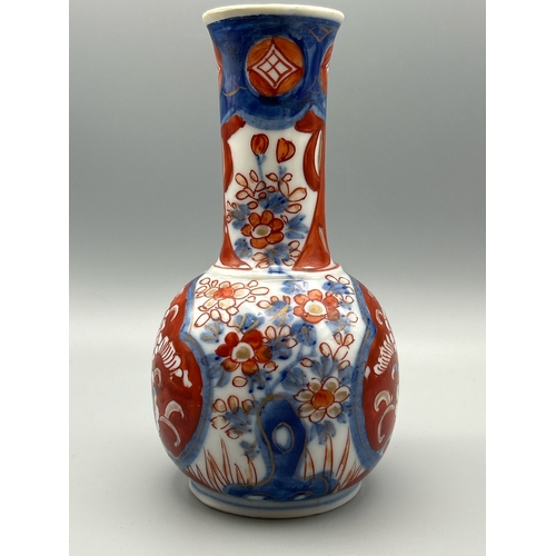 59 - A small Japanese Imari bottle vase, 15.8cm high / AN17