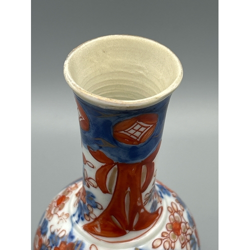 59 - A small Japanese Imari bottle vase, 15.8cm high / AN17