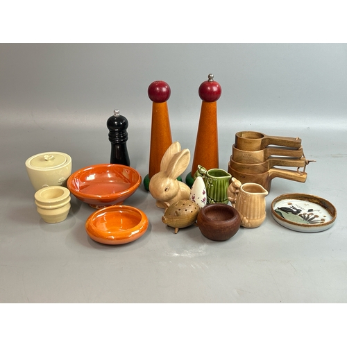 12 - Assorted kitchenware including wooden salt & pepper mills, Moorcroft orange bowls and Sylvac Rabbit ... 