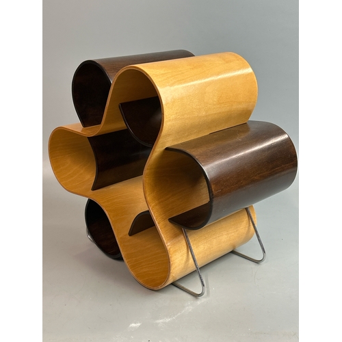 16 - A retro style wooden wine rack by Mint, designed by Tony Baxter, Scott Henderson and Alberto Mantill... 