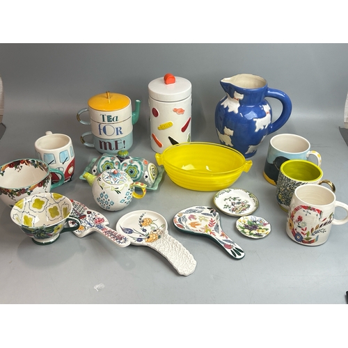 9 - Assorted colorful kitchenware including mugs, storage jar, jug and dishes (17) / T7