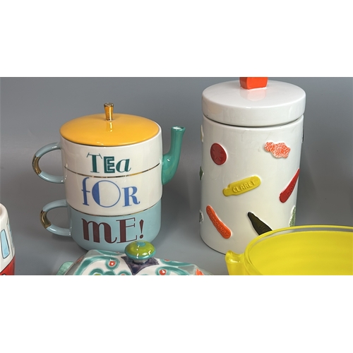 9 - Assorted colorful kitchenware including mugs, storage jar, jug and dishes (17) / T7