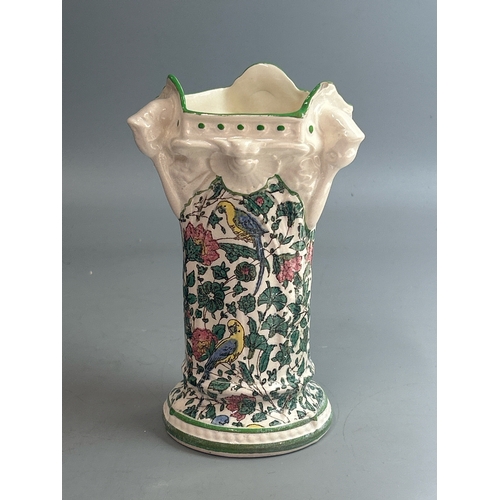 21 - A group of seven vases including Royal Doulton 'Persian' pattern, tallest 23cm high / T12