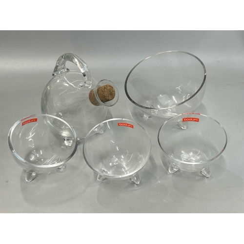 26 - Four Bodum bowls with a similar bottle / T13