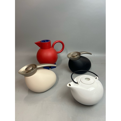 39 - Alessi flask, two Georg Janssen flasks and a ceramic teapot / T17