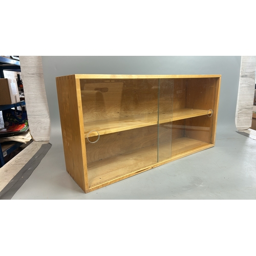 43 - Small shelf unit with sliding doors, 30 x 60 x 16.5 and a wooden magazine rack / T20