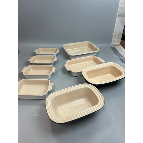 52 - Assorted Le Creuset ceramic oven dishes largest 31cm wide / T25