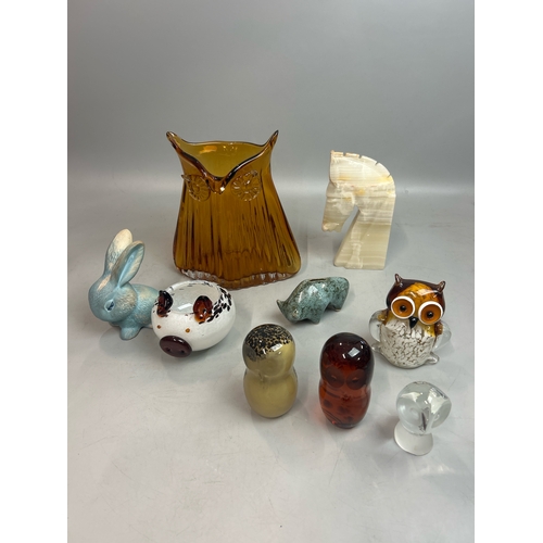 71 - A large amber glass Owl vase, 22cm high with glass Owl paperweights including Wedgewood, a ceramic 