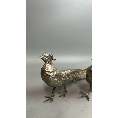 83 - Four vintage white metal Pheasant models, largest 14cm high, 29cm long / T35