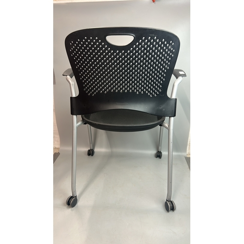 84 - A contemporary office chair on casters by Herman Miller / T