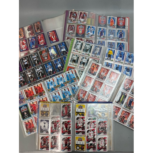 19 - A large collection of assorted football cards in seven folders including Match Attax and Panini, wit... 