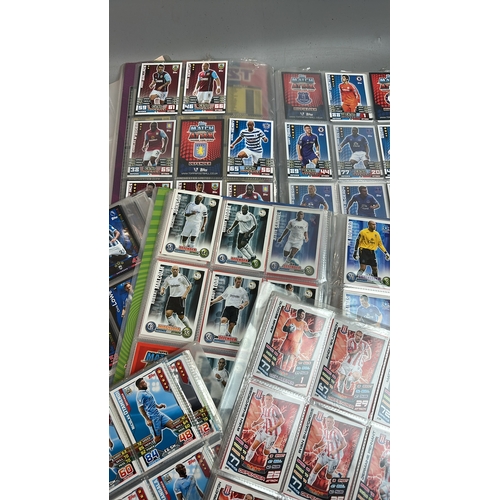 19 - A large collection of assorted football cards in seven folders including Match Attax and Panini, wit... 