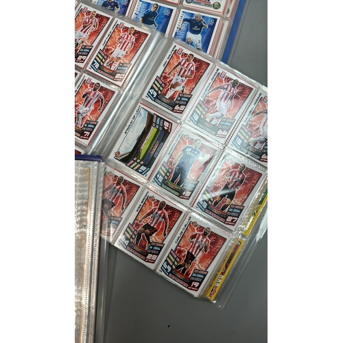 19 - A large collection of assorted football cards in seven folders including Match Attax and Panini, wit... 