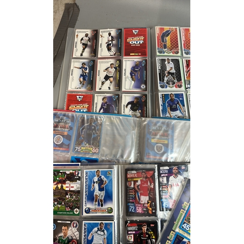 20 - A large collection of assorted football cards in seven folders mainly Match Attax and with chrome ca... 