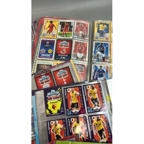 21 - A large collection of assorted football cards in seven folders mainly Match Attax with chrome cards.... 